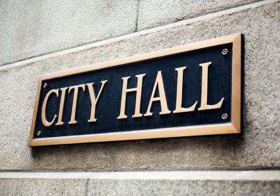 city hall sign on building
